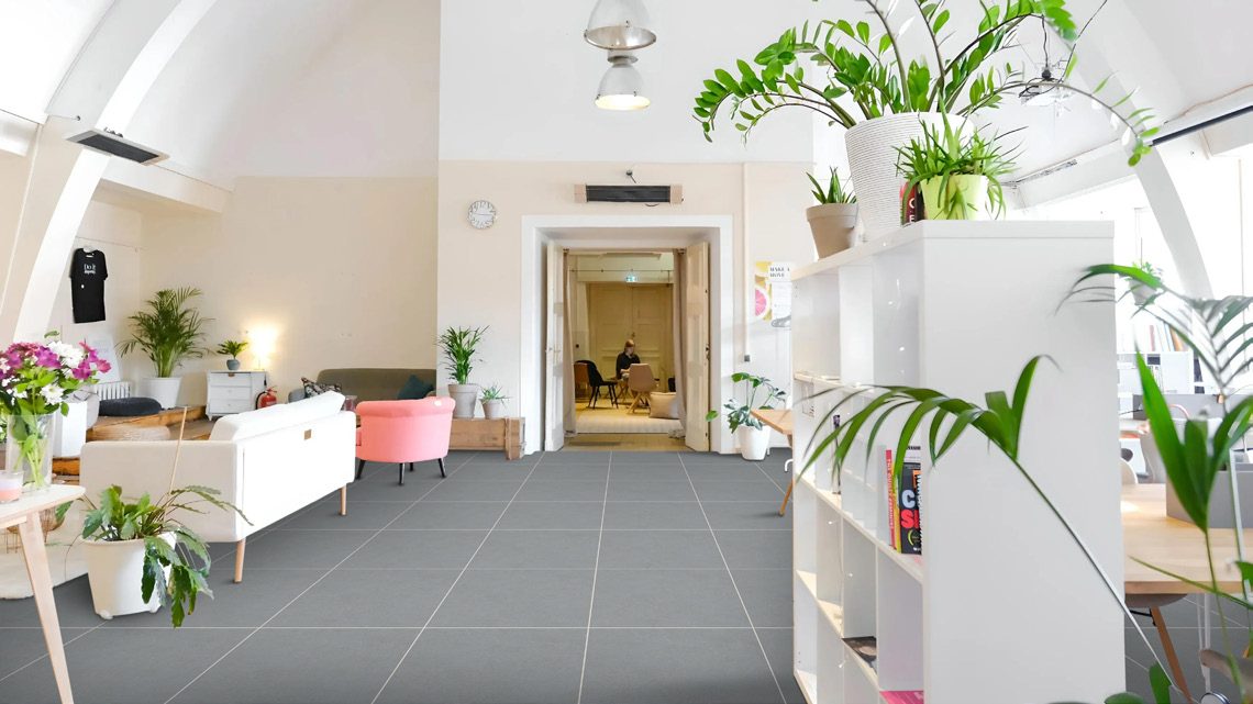 Open-plan office &mdash; Large-format matt floor, minimal joints
